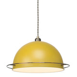 A retro looking ochre yellow lampshade hanging on a grey coloured twisted ceiling cable. The dome shaped lampshade has a brushed copper coloured ring approximately 2.5cm or 1 inch from the bottom.