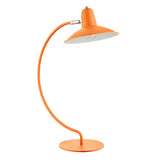 An arc shaped metal table lamp in a matte orange painted finish. The lamp is shown with a bulb just visible and is turned off in this picture.