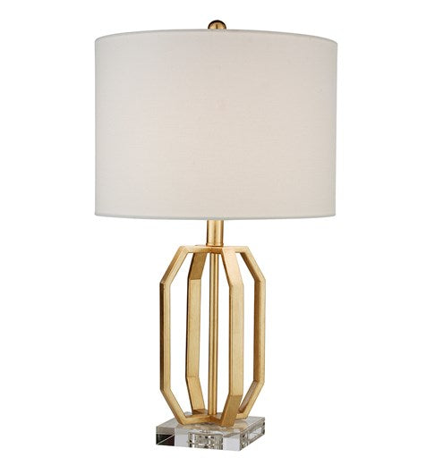 A cage style metal table lamp base on a square acrylic base plinth with a white straight sided cotton lampshade.