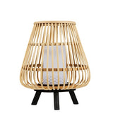 A bamboo cage style lantern style table lamp stood on a black coloured tripod base. The lantern has a white plastic pillar candle style central piece which houses a battery powered LED bulb. The light is turned off in this picture.